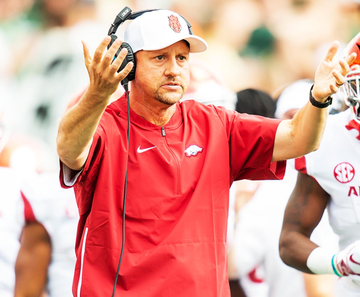 Jeff Traylor coaching on the sidelines for the Arkansas Razorbacks. 